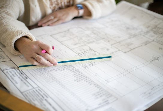 Designer with ruler