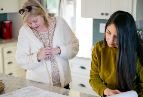 Wanda working with client